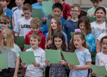 Children sing in a choir.