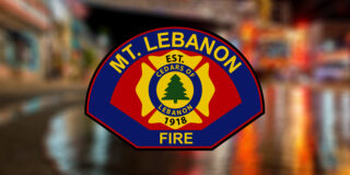 Mt. Lebanon Fire Department logo in front of a blurred image.