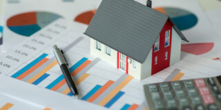 iStock image of a house and a chart