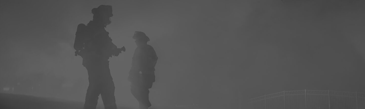 Firefighters in smoke
