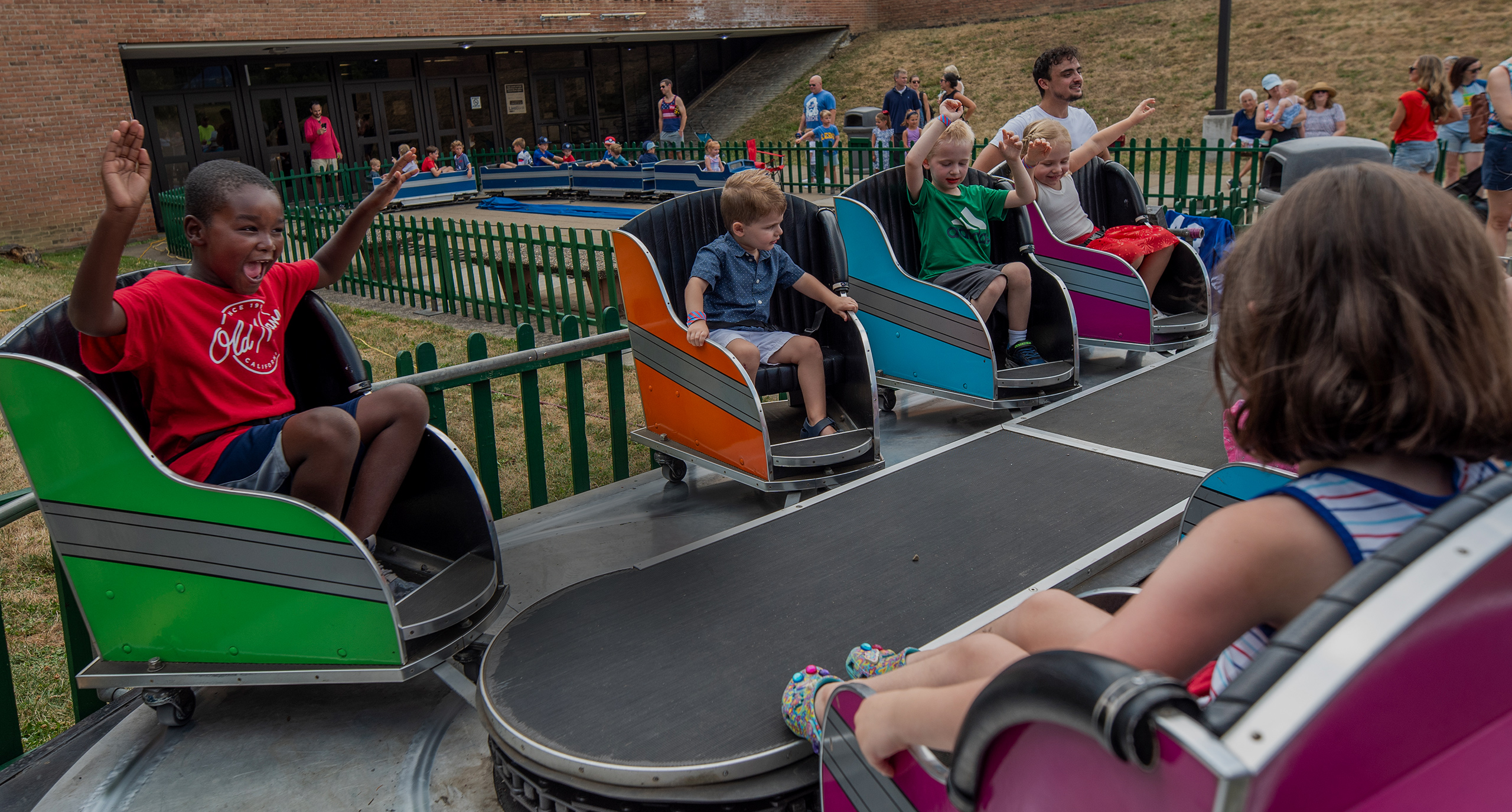 Children riding the whip ride on 4th of July 2024